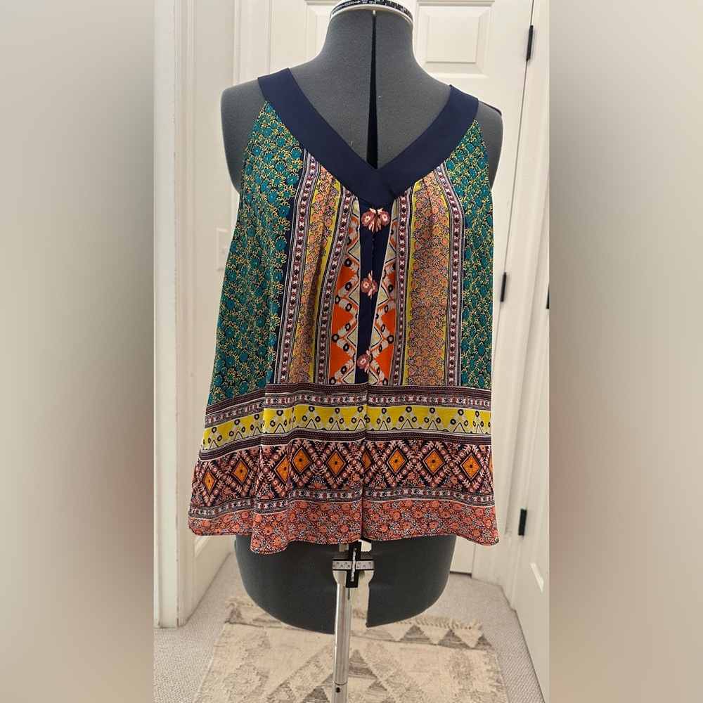 Anthropologie has Maeve Colorful Geometric Print Blouse, sz 4